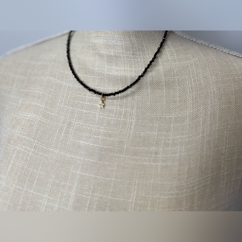 Black Beaded Necklace Small Gold Star Charm.